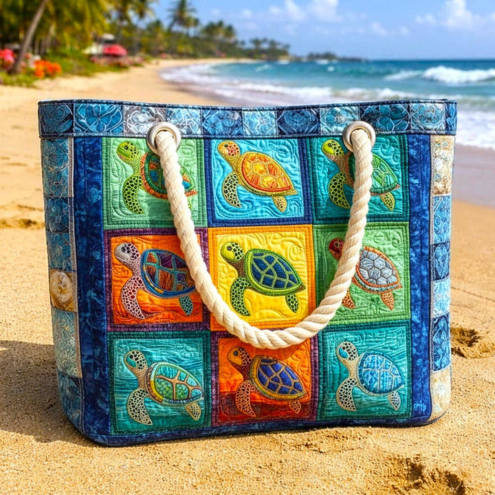 Veda Bremen Turtle Calm quilted beach bag with turtle pattern, spacious design, and sturdy handles for seaside outings.