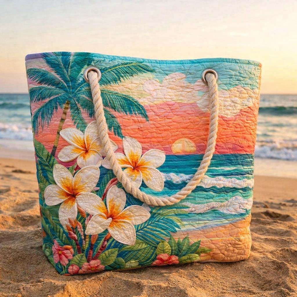 Veda Bremen Tropical Vibe quilted beach bag with tropical leaf pattern and sturdy handles, perfect for seaside outings.