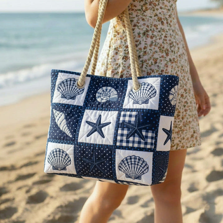 Veda Bremen Shell Serenity quilted beach bag with a shell pattern, stylish and spacious for beach essentials.