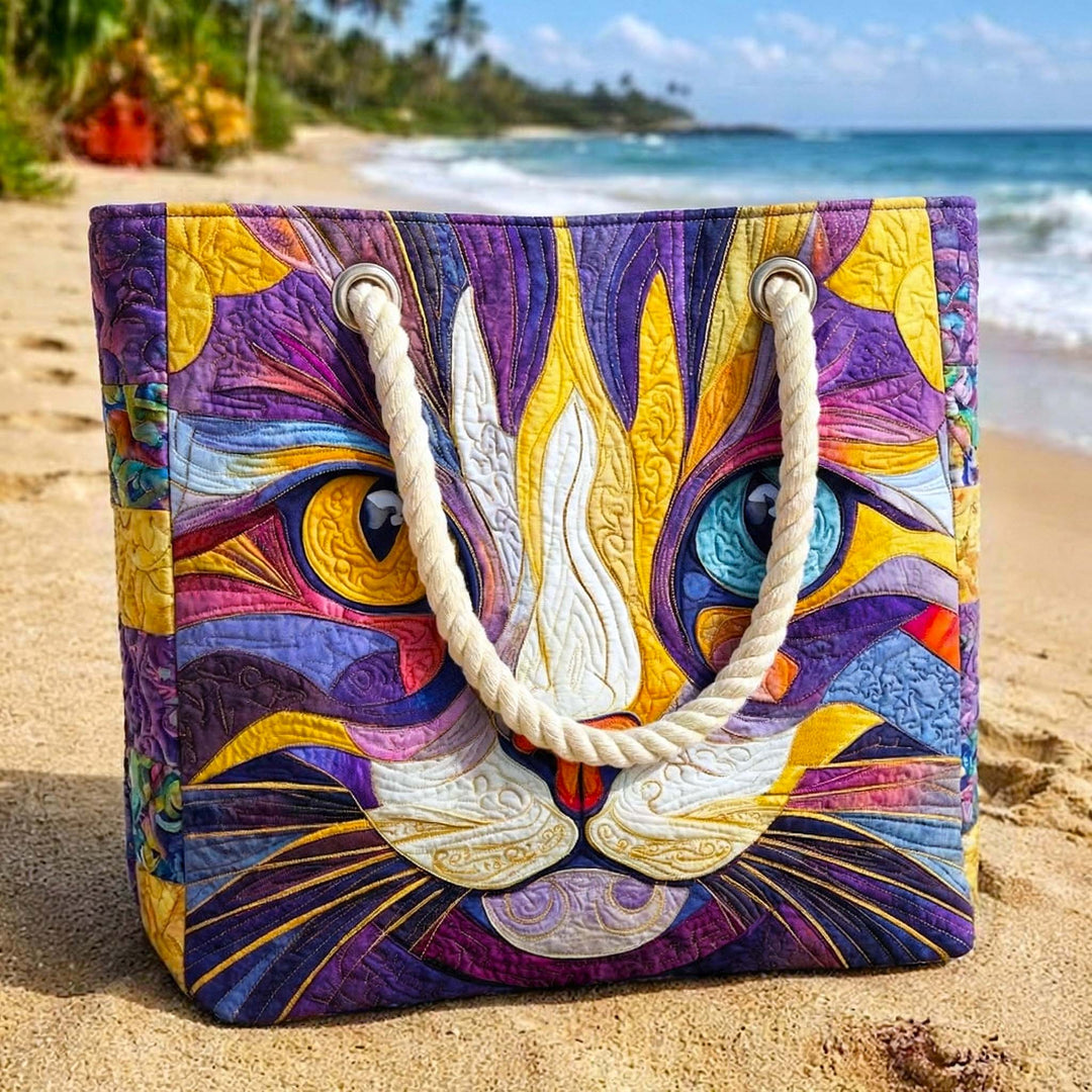 Veda Bremen Catitude quilted beach bag with woven handles, stylish and spacious for carrying essentials to the beach.