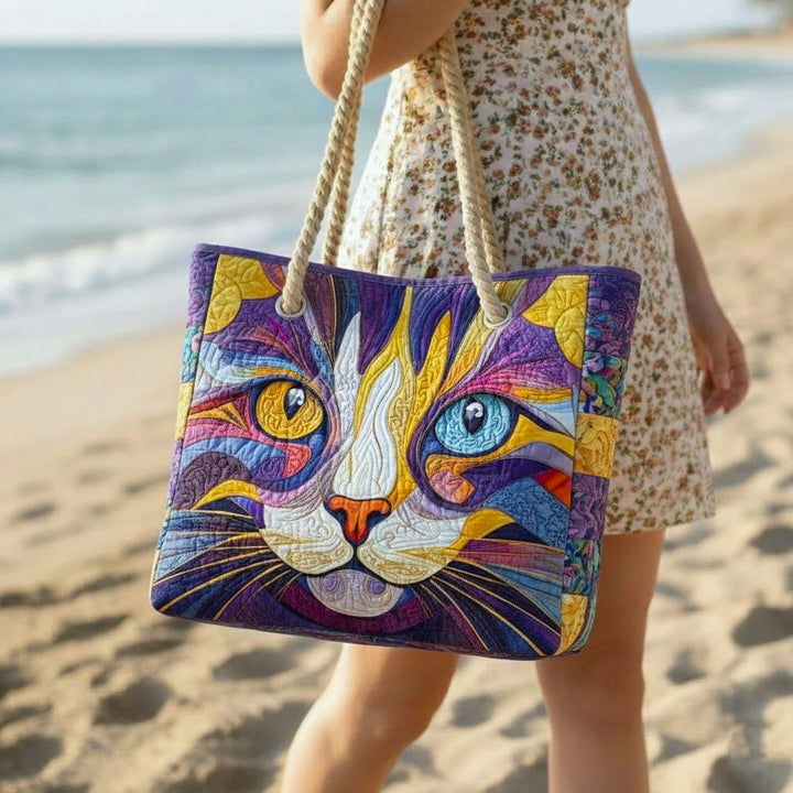 Veda Bremen Catitude quilted beach bag with striped handles, showcasing its spacious design and stylish pattern for seaside outings.