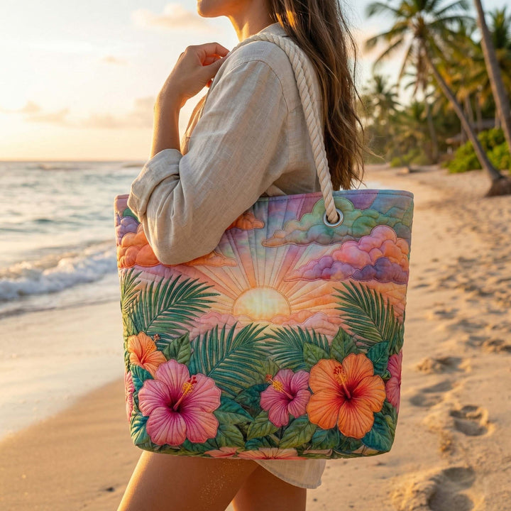 Quilted tropical sunrise beach bag by Veda Bremen with vibrant pattern, spacious design, perfect for seaside outings.