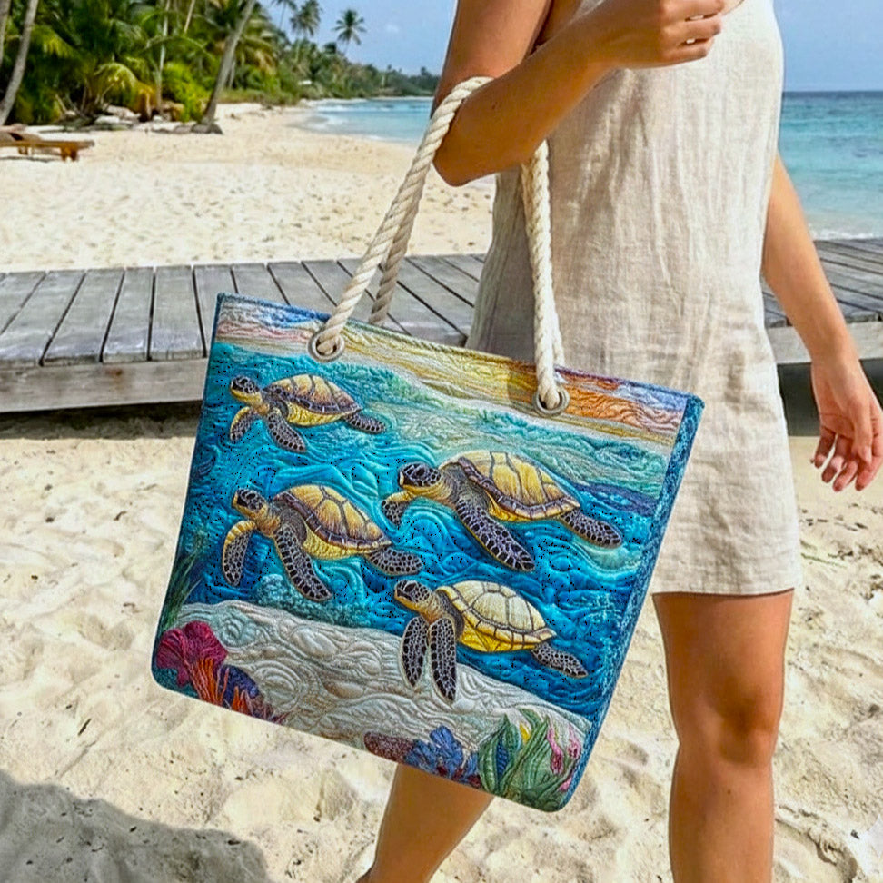 Quilted Veda Bremen Sea Turtle beach bag with woven handles, perfect for seaside outings and summer beach days.
