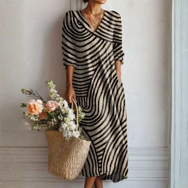 Veda Bremen Grace vintage charm dress, elegant timeless design, close-up of the stylish dress fabric and intricate details.