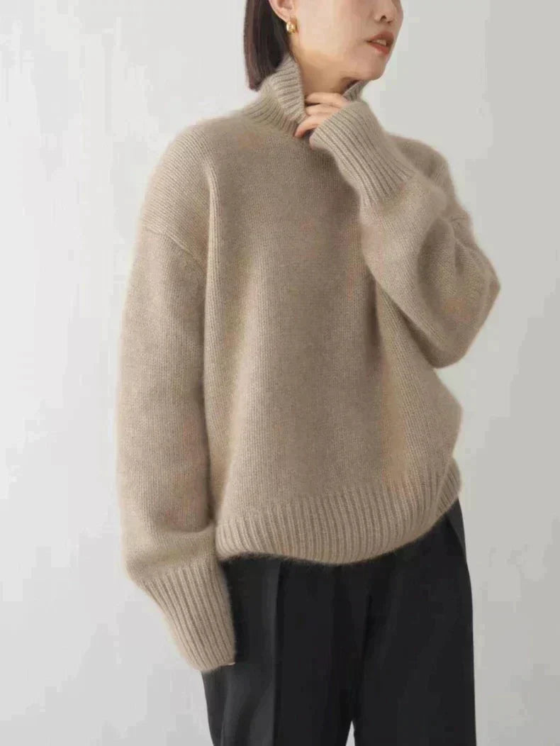 LuroLondon Marilou Cashmere Turtleneck sweater in khaki, featuring a cozy high-neck design and soft cashmere fabric.