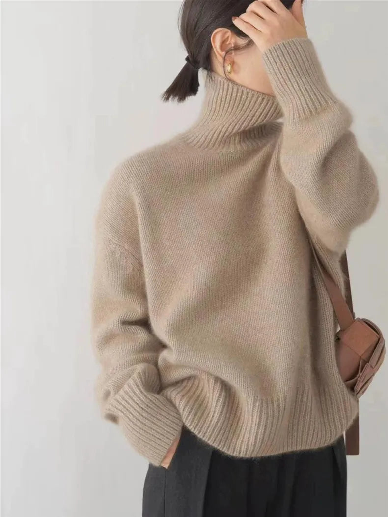 LuroLondon Marilou Cashmere Turtleneck in lin khaki, showcasing a cozy, high-quality cashmere sweater with a turtleneck design.