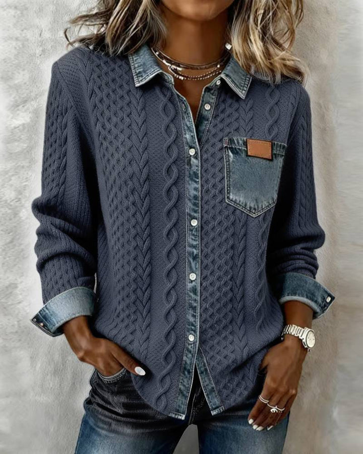 Navy blue Tiffany knit top by LuroLondon, featuring a fitted design with ribbed texture and long sleeves.