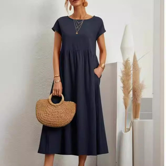 Veda Bremen Gabrielle midikleid with flowing cut, lightweight fabric, and elegant design displayed on a model.