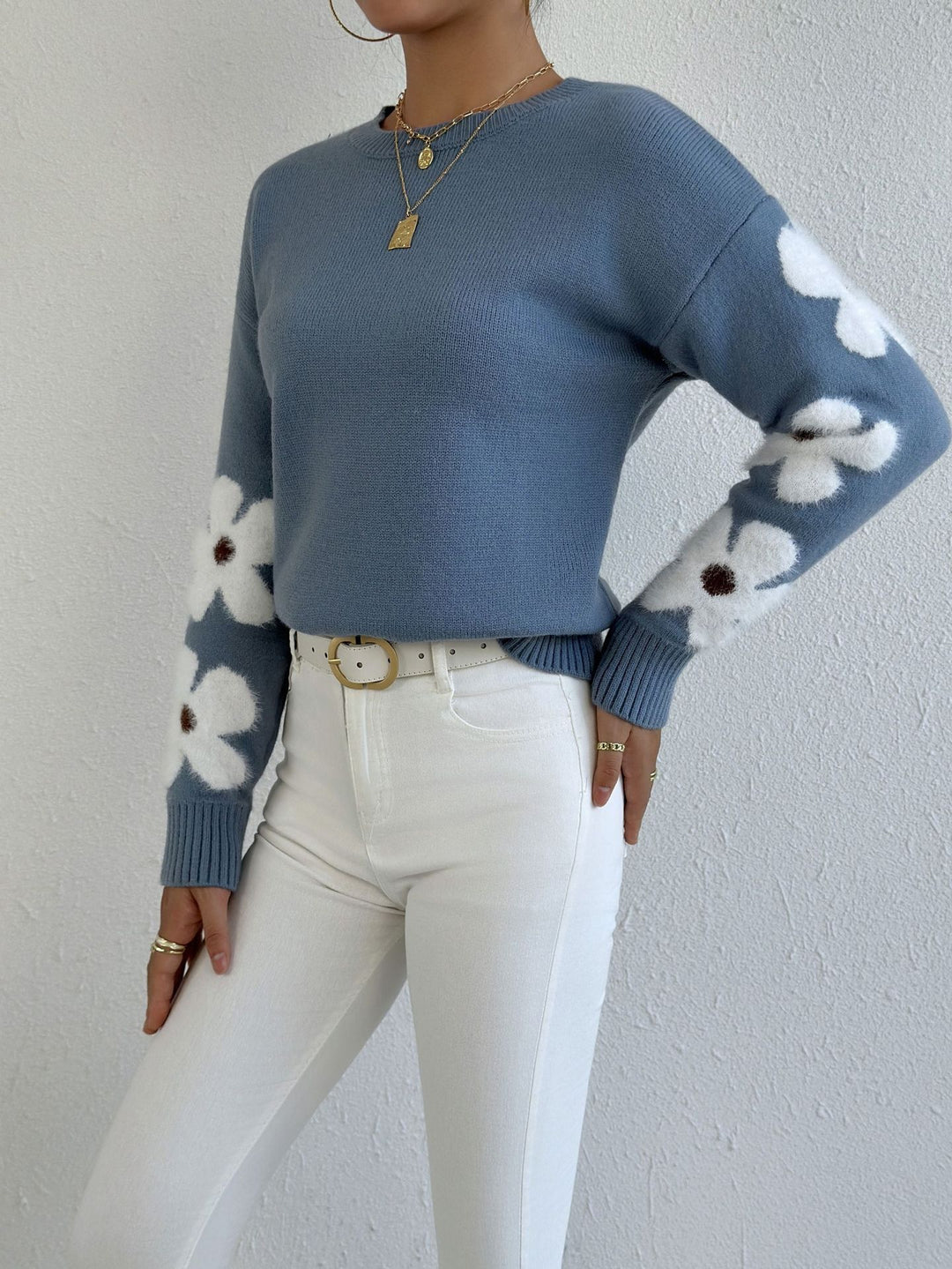 LuroLondon floral round neck sweater featuring vibrant floral patterns and cozy knit fabric, front view.