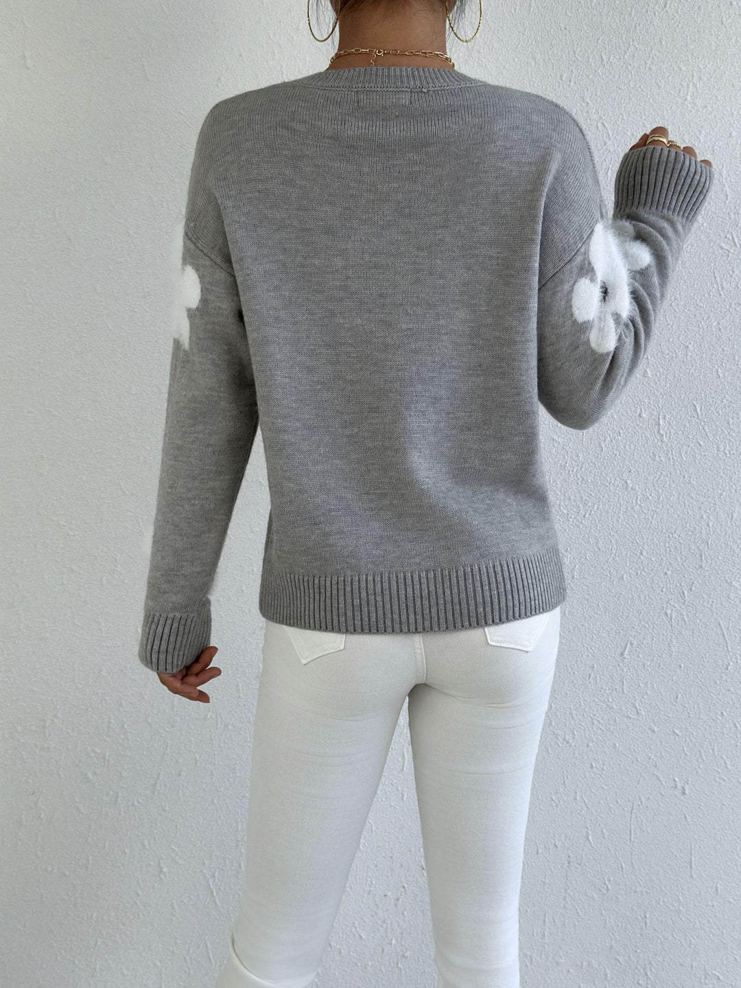 LuroLondon floral round neck sweater with colorful flower pattern, soft knit fabric, and long sleeves on a white background.
