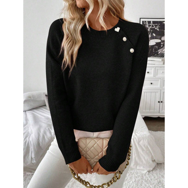 LuroLondon Button-Decorated Sweater featuring a cozy knit fabric with stylish button details on the front.