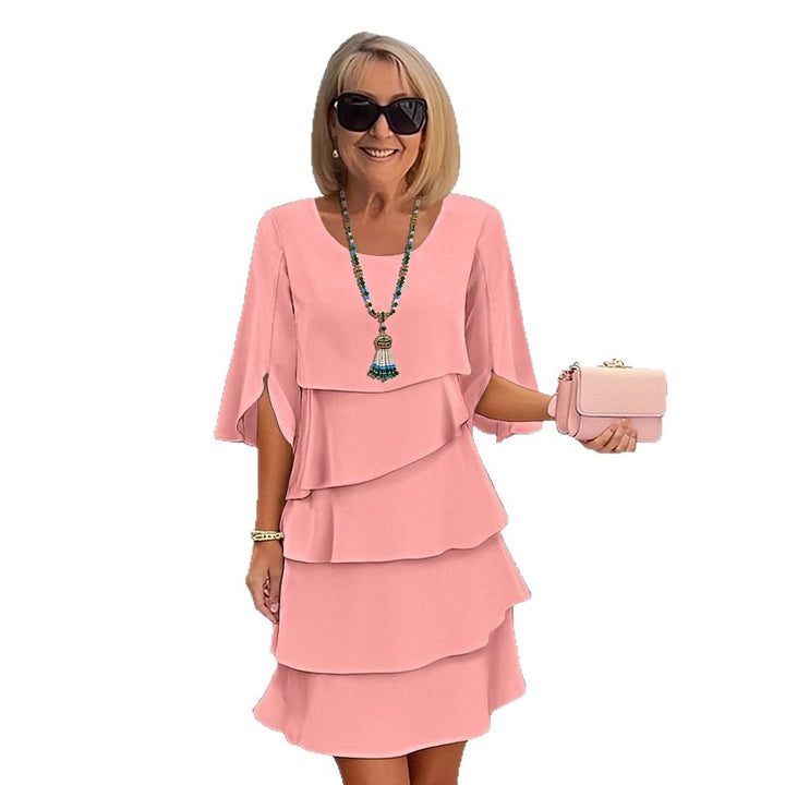 Veda Bremen layered dress with ruffles featuring a feminine design and flowing fabric, perfect for stylish occasions.