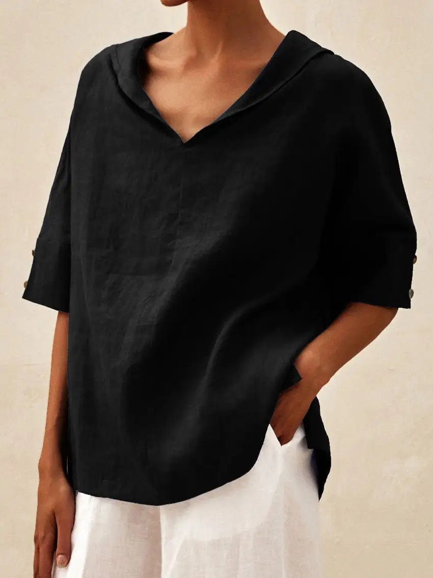 Classic linen blouse with V-neck from Veda Bremen, shown in a natural light, highlighting its relaxed fit and soft fabric.