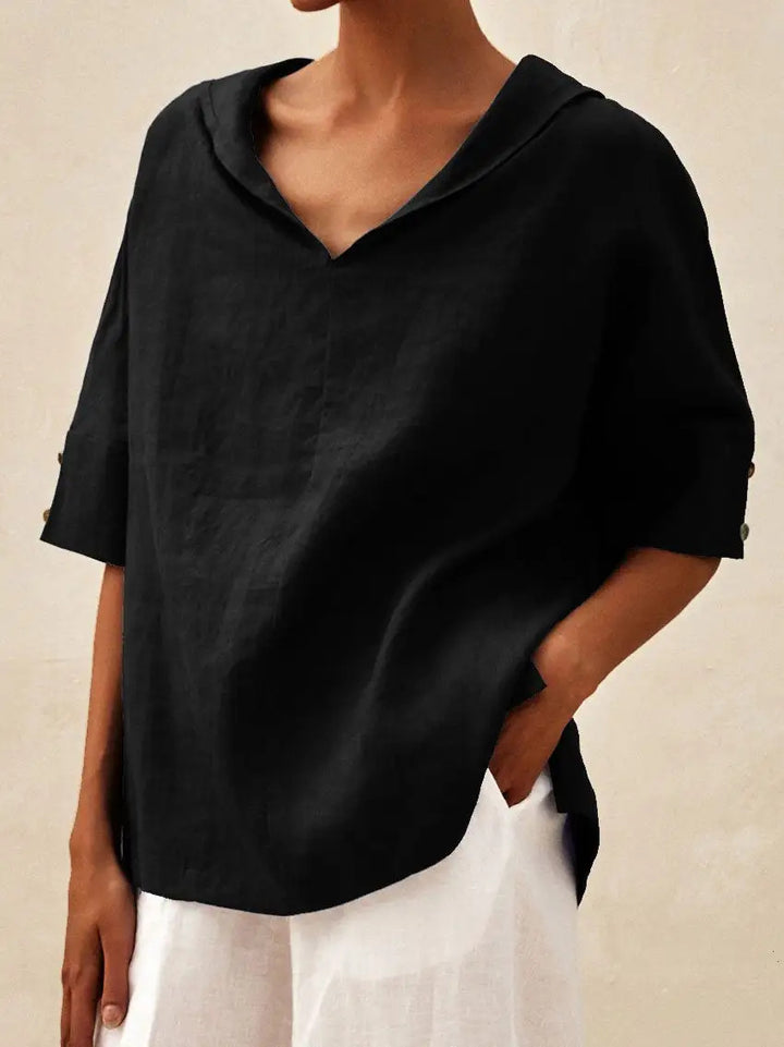 Classic linen blouse with V-neck from Veda Bremen, shown in a natural light, highlighting its relaxed fit and soft fabric.