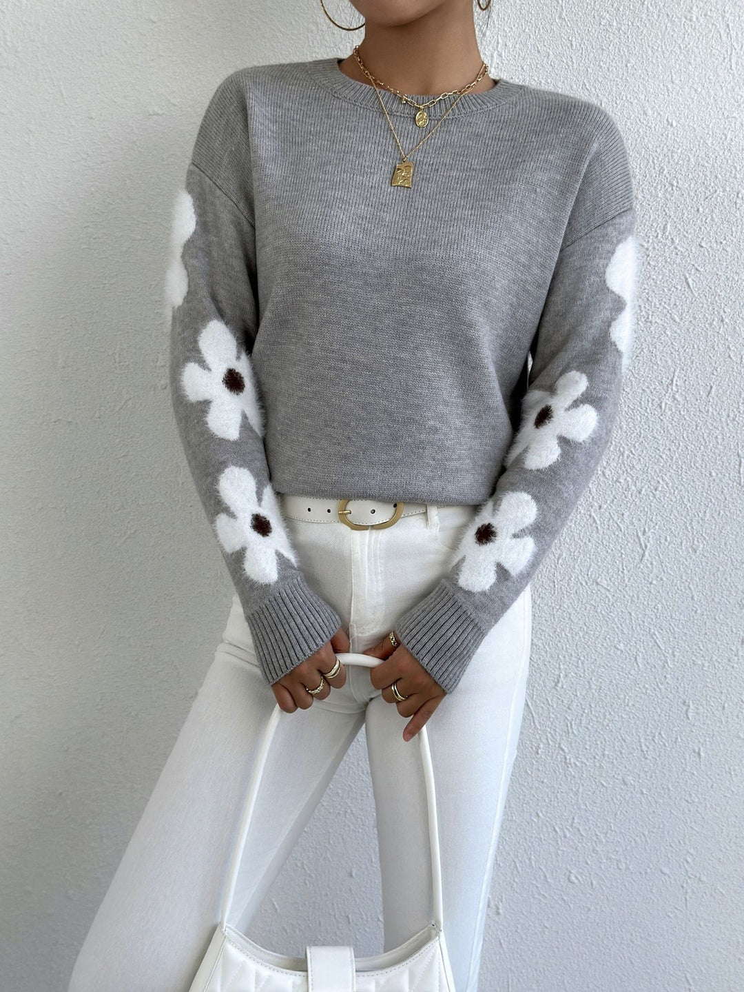 LuroLondon floral round neck sweater with colorful floral pattern and soft knit fabric, shown on a white background.