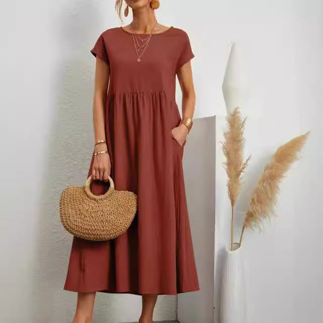 Veda Bremen Gabrielle mid-length dress with flowing fabric and elegant fit, styled for a sophisticated look.