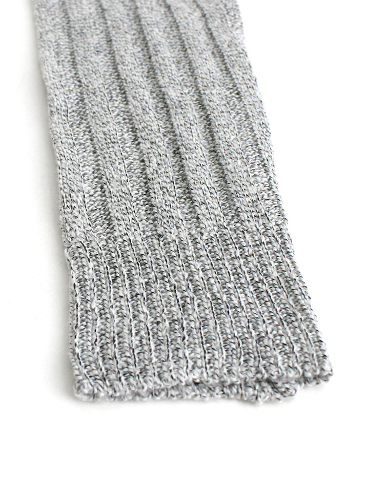 Veda Bremen knitted cardigan with textured structure, featuring a cozy, chunky design and ribbed cuffs for a stylish, warm look.