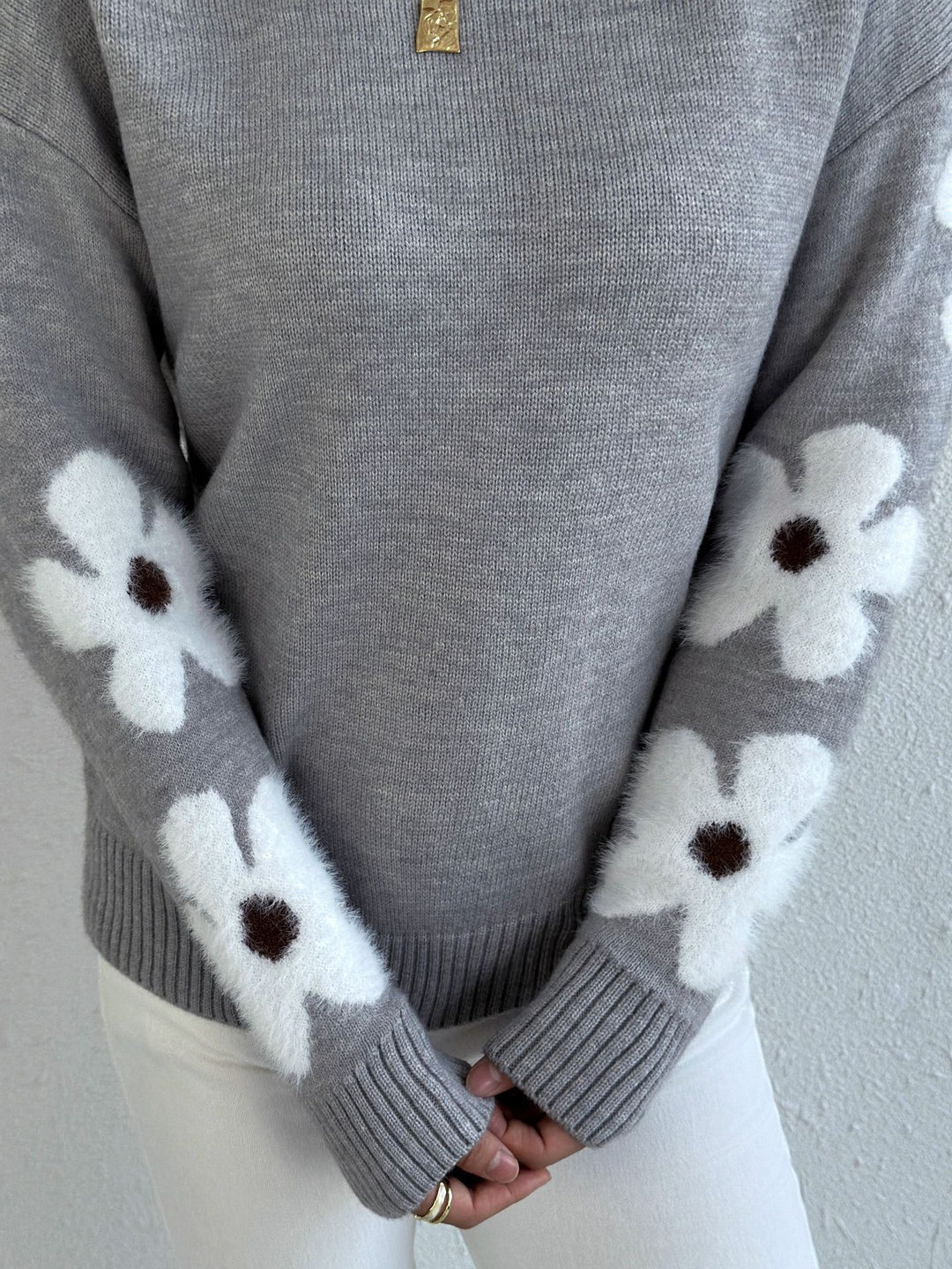 LuroLondon floral round neck sweater with vibrant flower patterns and soft knit fabric, displayed on a neutral background.