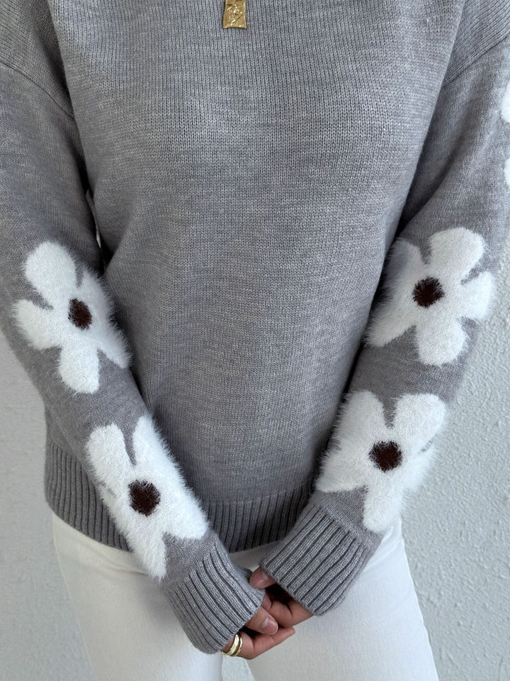 LuroLondon floral round neck sweater with vibrant flower patterns and soft knit fabric, displayed on a neutral background.