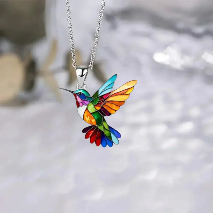 Veda Bremen Kolibri necklace with matching free earrings, featuring intricate bird pendant in elegant jewelry design.