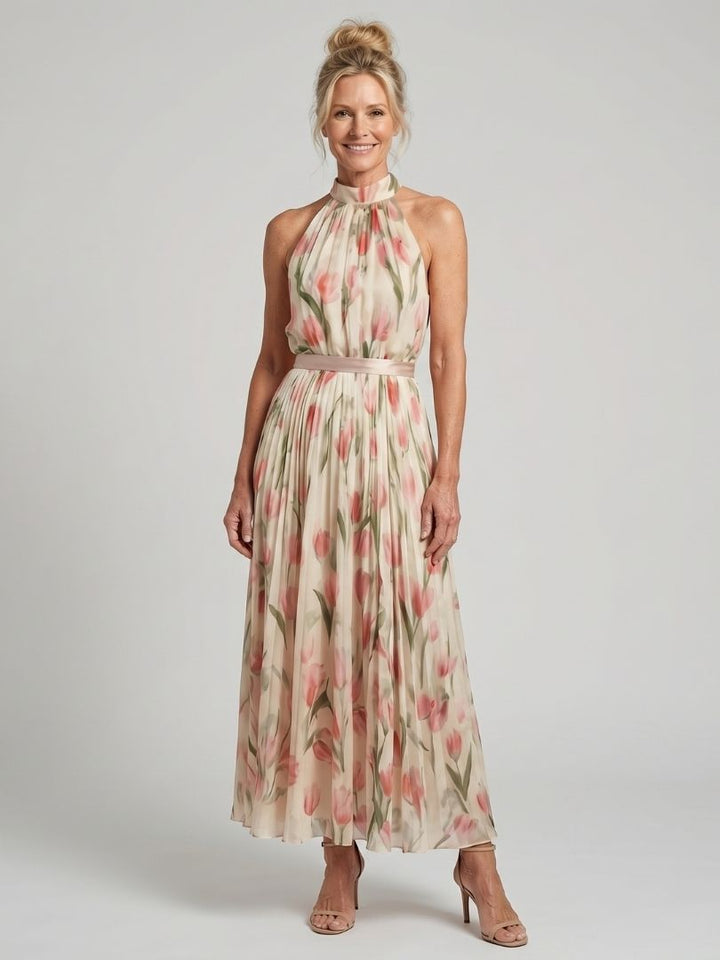 Veda Bremen Aurelle floral midi dress with halter neck and vibrant flower pattern, elegant and stylish for summer wear.