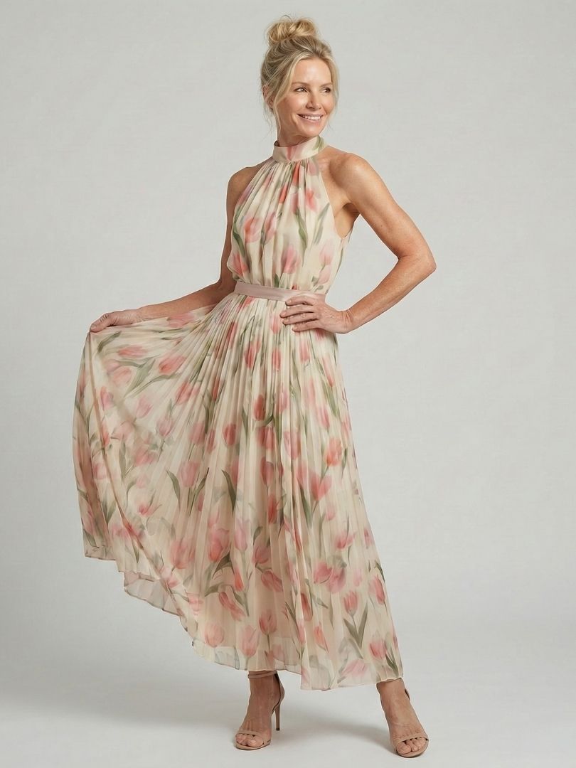 Veda Bremen Aurelle floral midi dress with halter neckline, featuring a vibrant flower print and elegant silhouette.