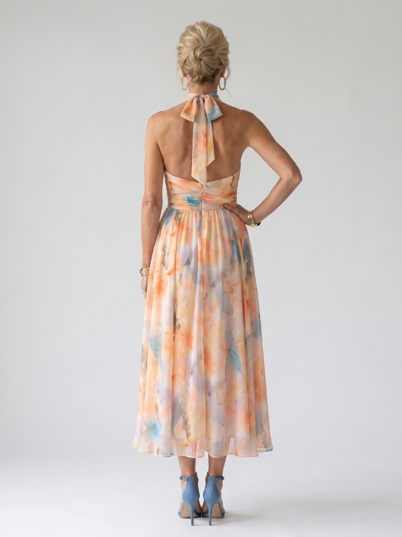 Veda Bremen Elin soft midikleid with halter neckline, flowing fabric, and elegant design, perfect for stylish occasions.