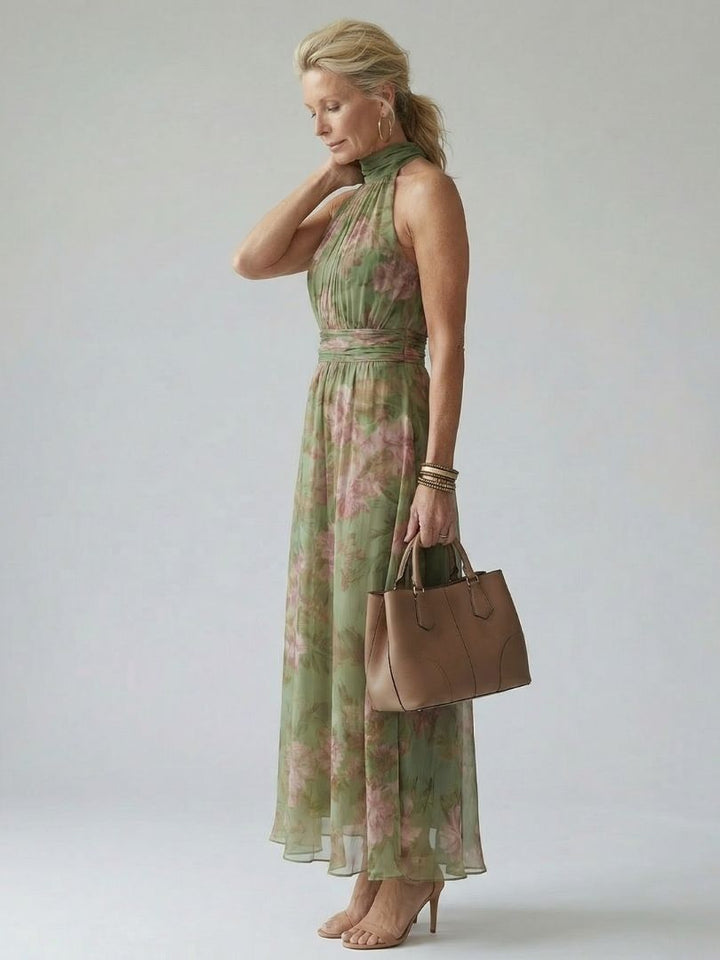 Veda Bremen Mirelle gathered halter midi dress in elegant fabric, showcasing a sleek, fitted silhouette with a high neckline.