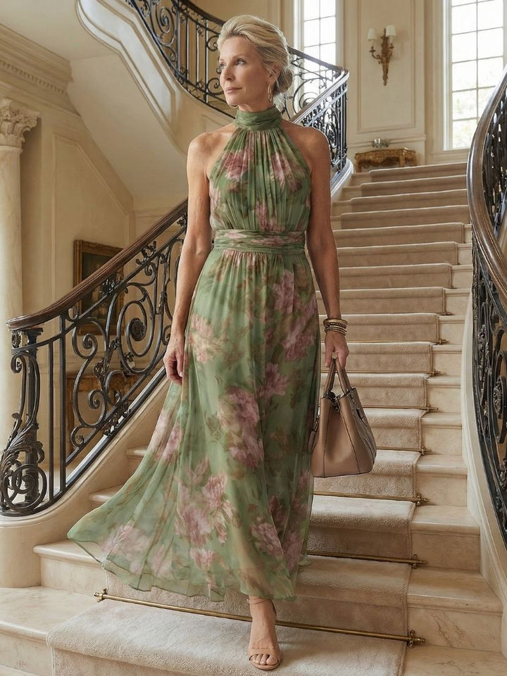 Veda Bremen Mirelle gathered halter midi dress in a soft, flowing fabric, showcasing a stylish neckline and elegant silhouette.