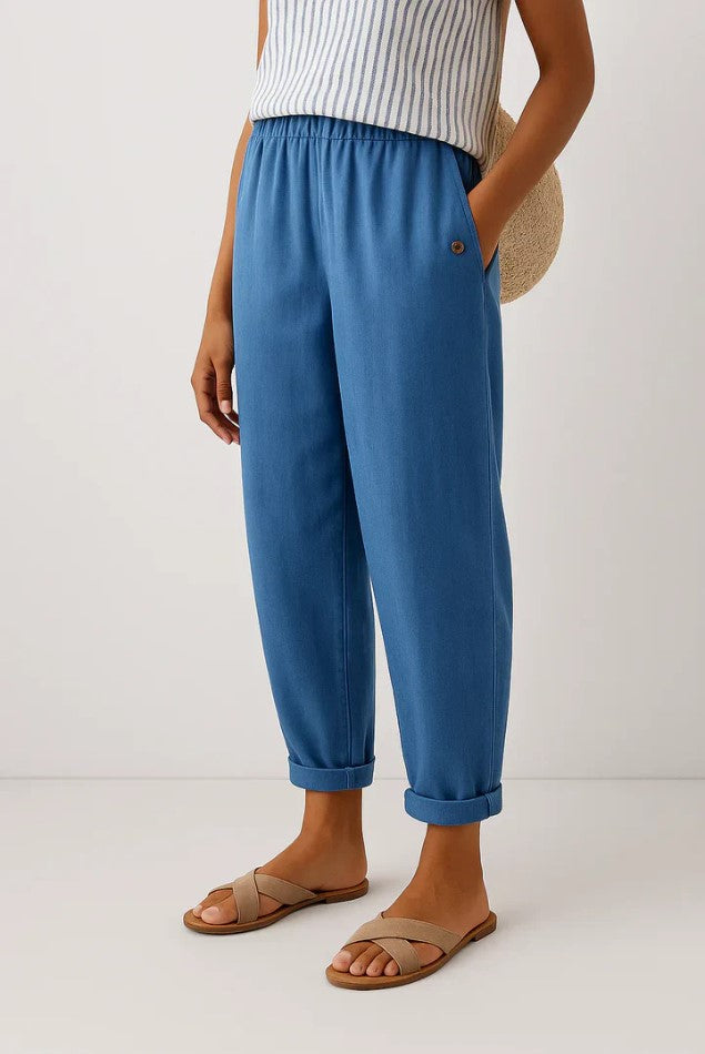 Veda Bremen Reyna timeless casual pants in neutral fabric, featuring a relaxed fit and minimalist design.