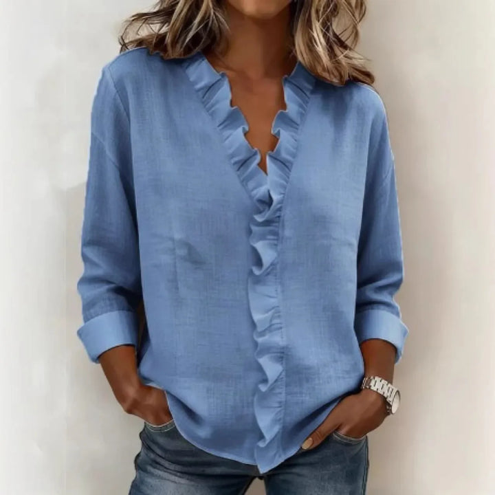 Veda Bremen Sorelle™ blouse with vertical ruffle detail, showcasing timeless style and elegant design.