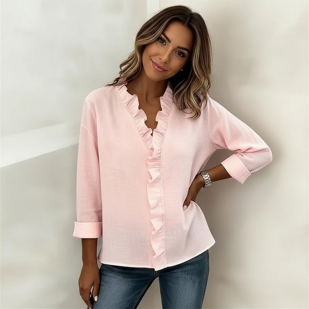 Veda Bremen Sorelle™ blouse with vertical ruffle details, showcasing a timeless, elegant style in a lightweight fabric.
