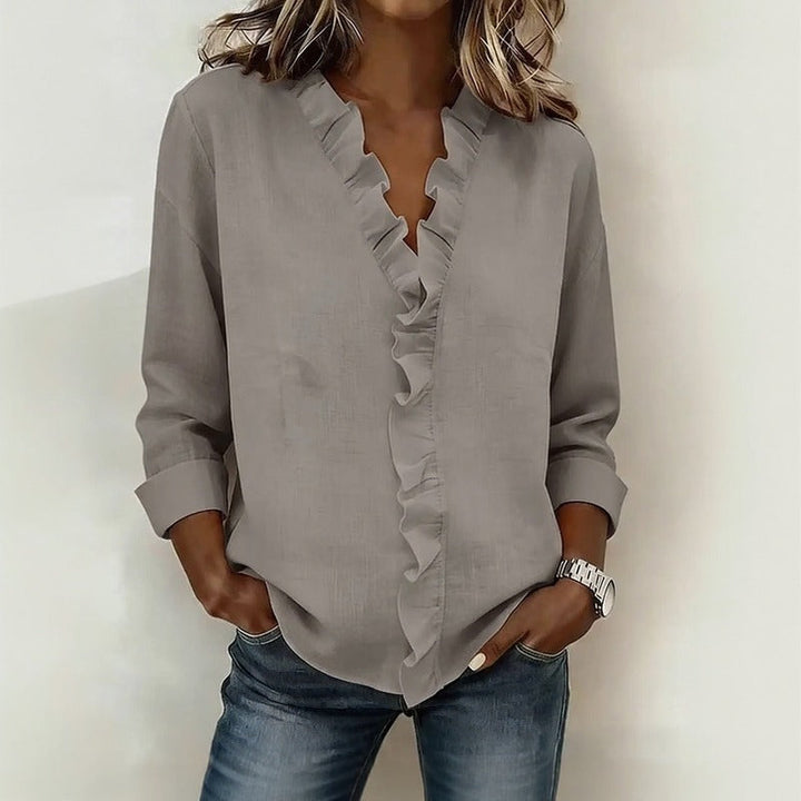 Veda Bremen Sorelle™ blouse with vertical ruffle, showcasing elegant, timeless style in soft fabric and classic design.