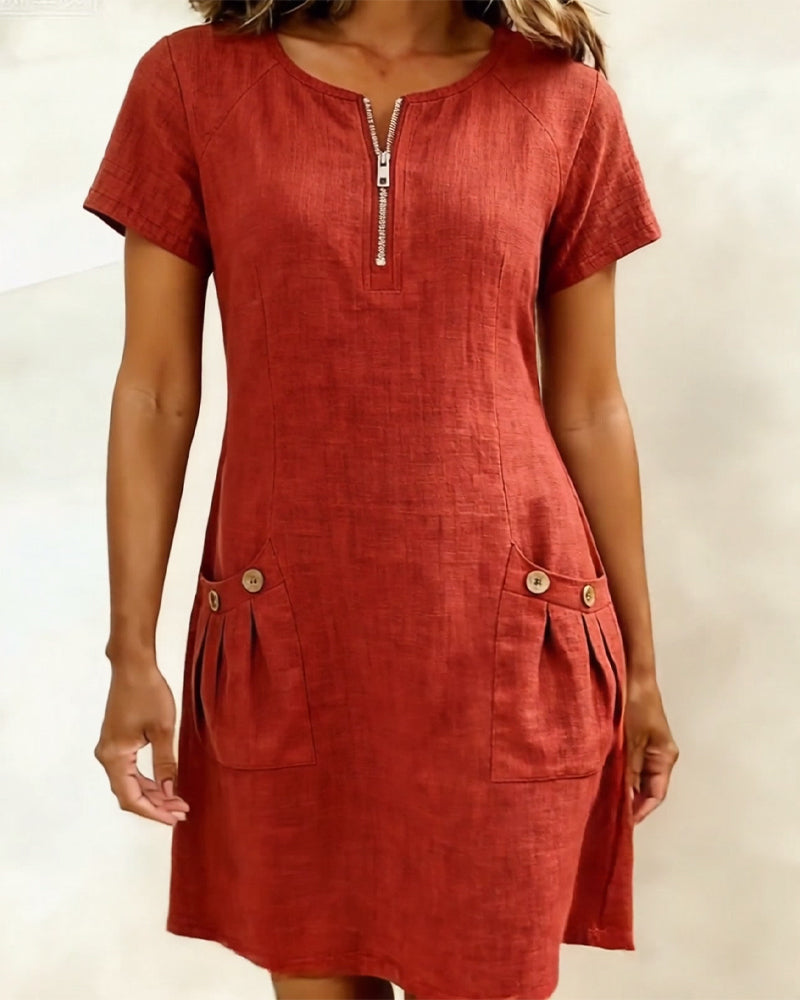 Veda Bremen Dariae linen blend A-line dress with a relaxed fit and soft fabric, displayed on a hanger.