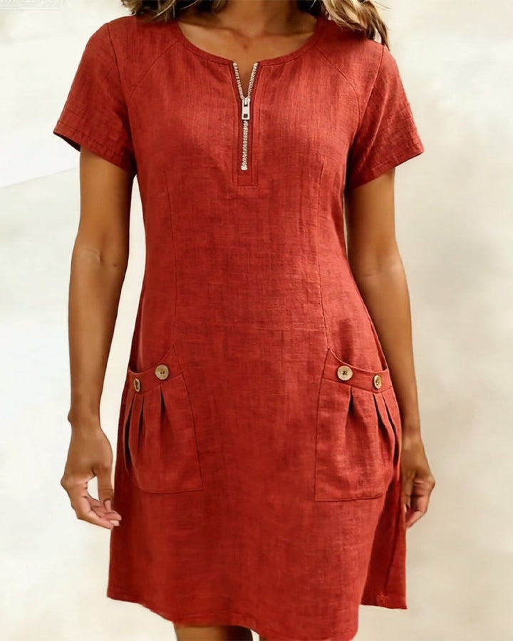 Veda Bremen Dariae linen blend A-line dress with a relaxed fit and soft fabric, displayed on a hanger.