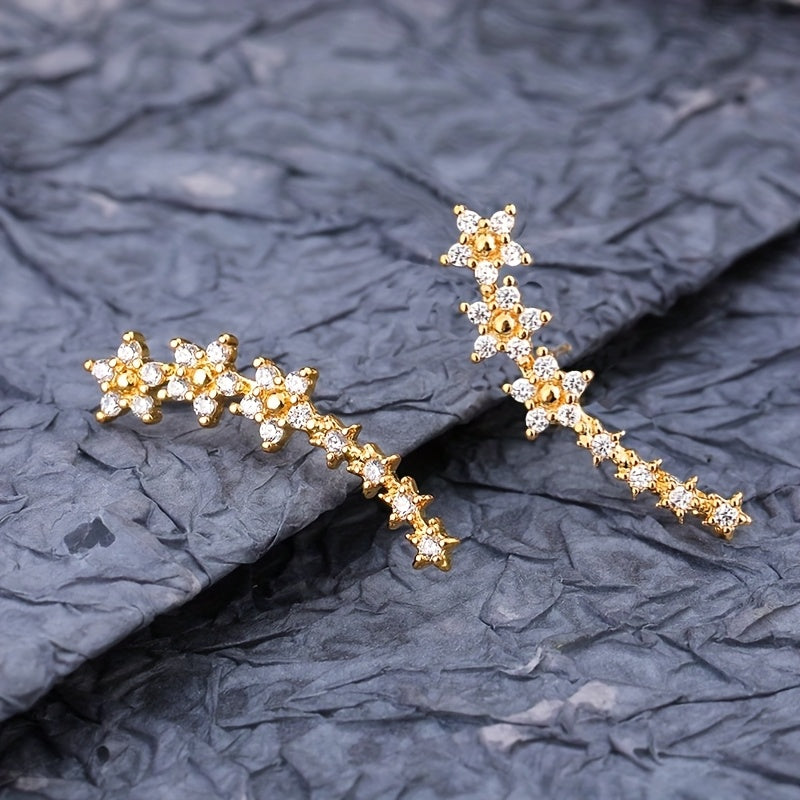 Veda Bremen timeless floral earrings featuring delicate flower designs in silver, perfect for elegant or casual wear.