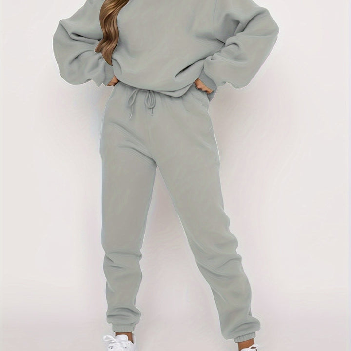 LuroLondon The Simple Two-Piece set featuring a minimalist top and matching bottom in soft, neutral fabric.