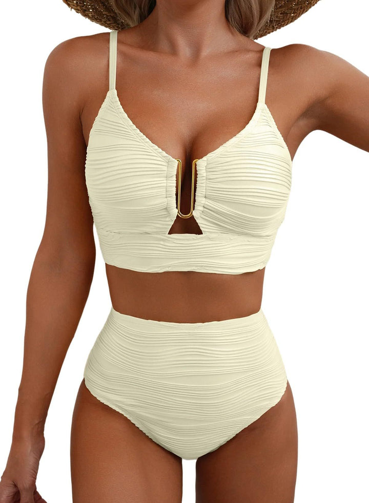 Beige Jenny bikini set by Veda Bremen featuring shaping design and adjustable straps, shown on a model.