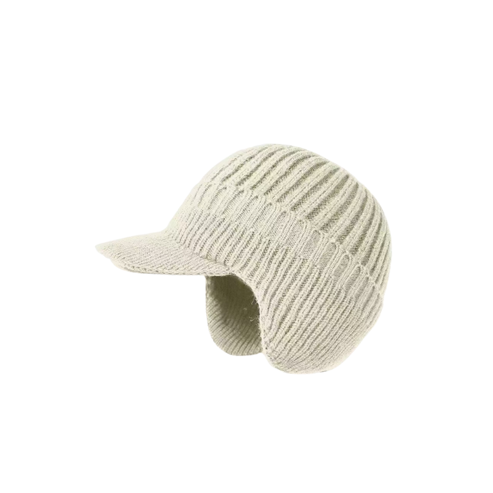 Beige Snuggler Winter Hat by Lurolondon.co.uk, cozy knit beanie with a soft, warm texture, perfect for cold weather.