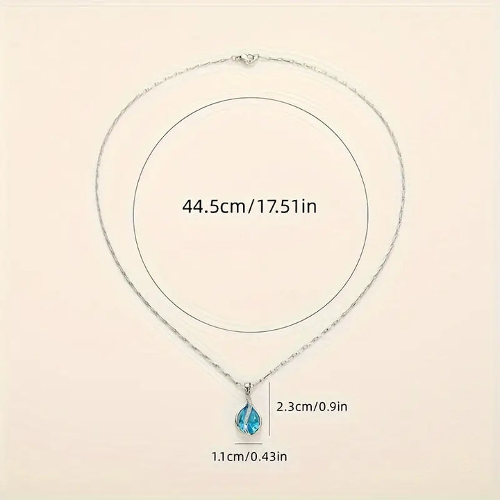 Veda Bremen Sapphire Collection Ozean Tropfen necklace featuring a teardrop-shaped sapphire pendant on a delicate chain.