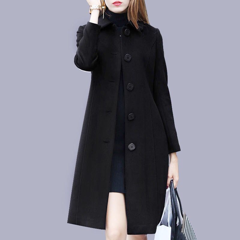 Black Helena woolen coat by Lurolondon.co.uk, stylish long outerwear with a tailored fit and classic collar detail.