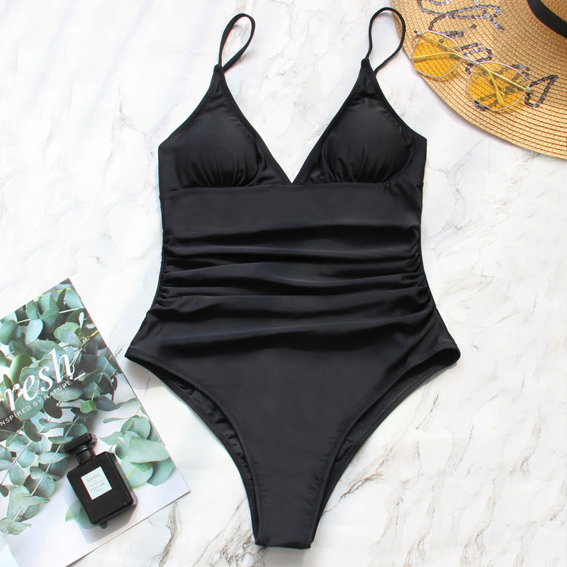 Black Serena one-piece swimsuit by Veda Bremen, featuring a sleek, fitted design and classic swimwear style.