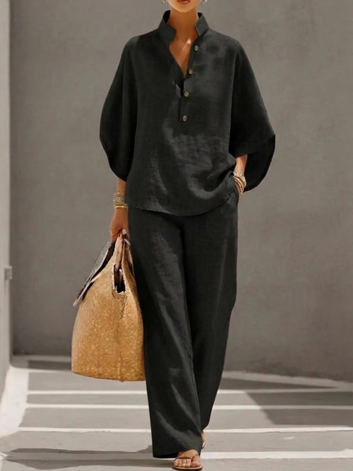 Black Ellie cotton and linen set by Veda Bremen, casual and comfortable fabric blend, shown on a model.
