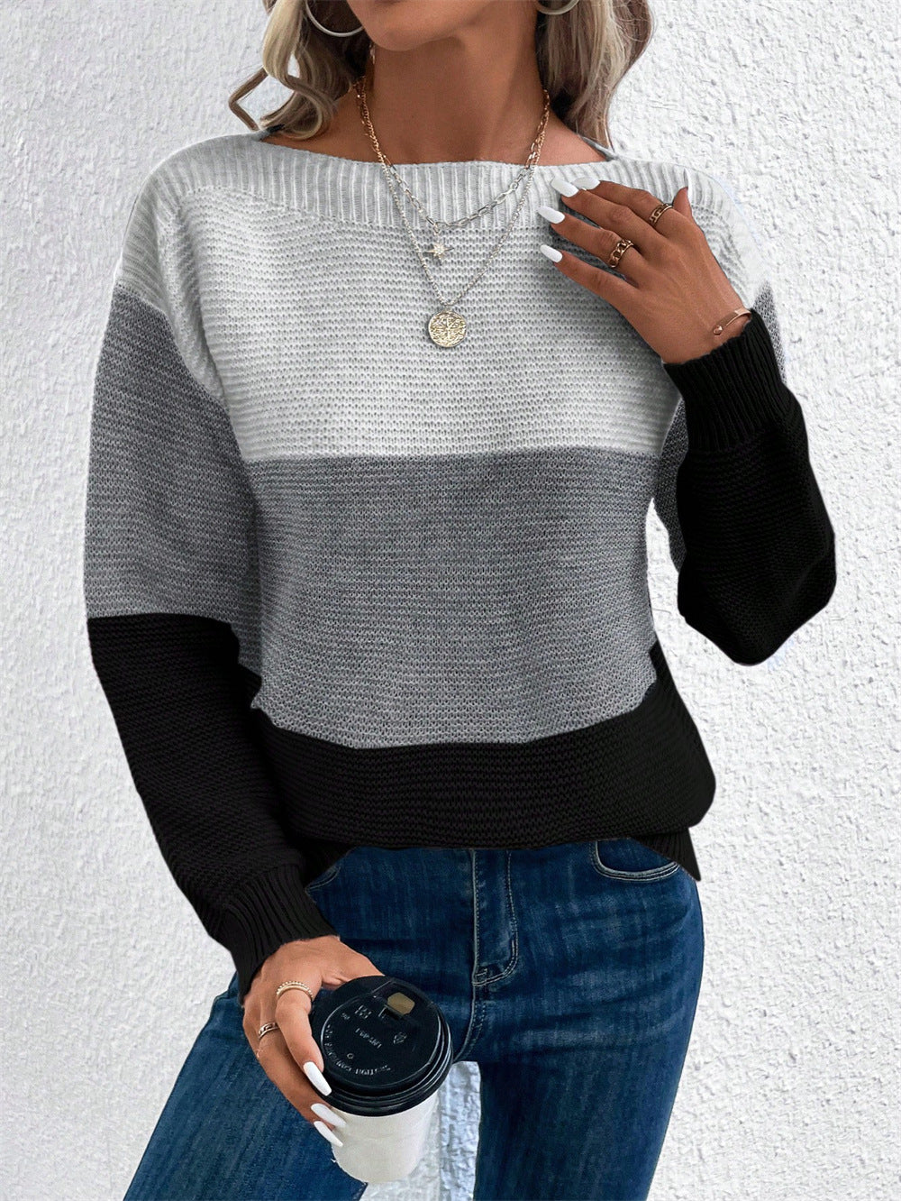 Black Lydia knitted sweater by Lurolondon.co.uk, featuring a cozy, textured knit design perfect for casual wear.