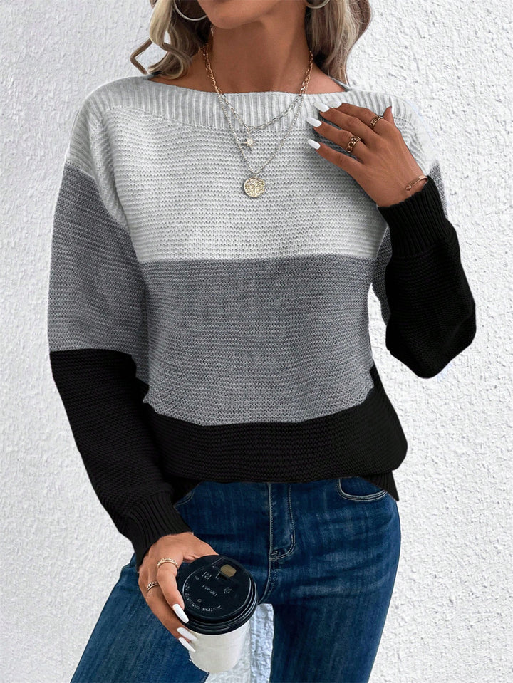 Black Lydia knitted sweater by Lurolondon.co.uk, featuring a cozy, textured knit design perfect for casual wear.