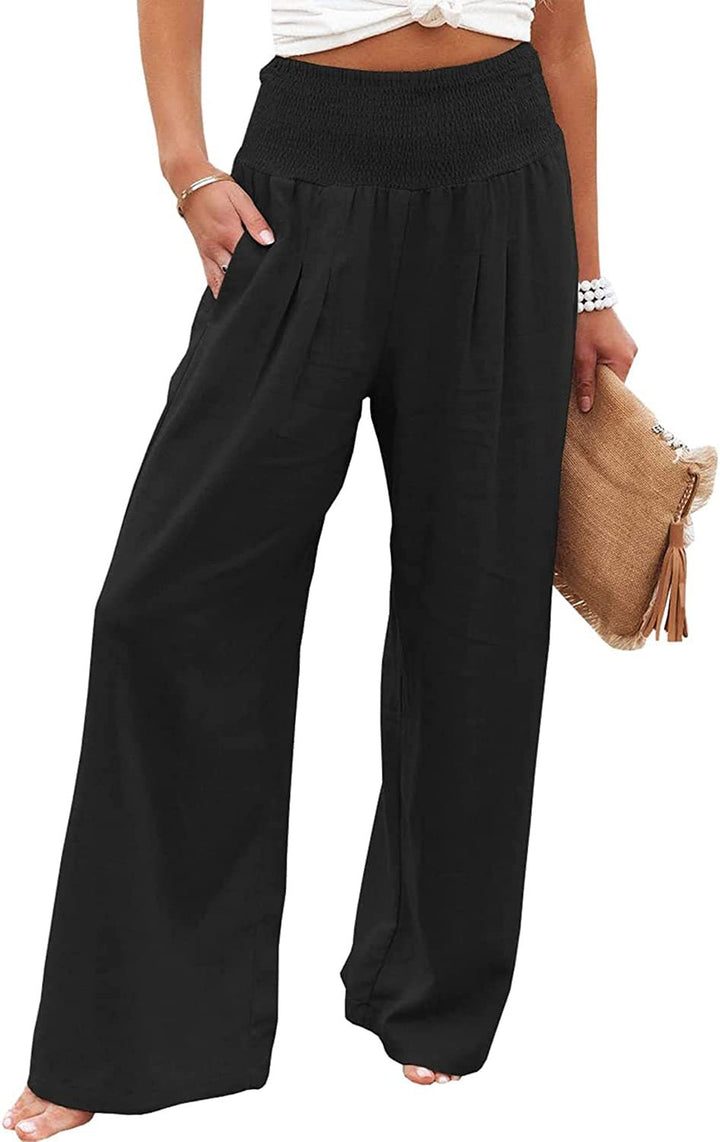 Black Romy Weithose pants by Veda Bremen, featuring a fitted high-waist design and sleek slim-leg silhouette.