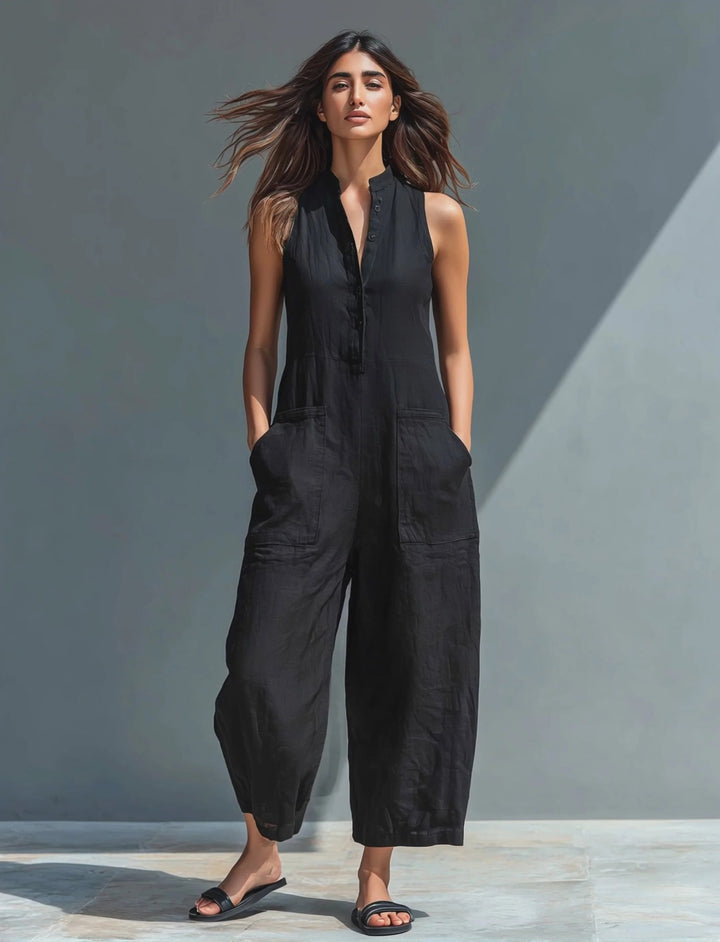 Black Veda Bremen Lotte sleeveless minimalist jumpsuit with a sleek, modern design, perfect for contemporary fashion.