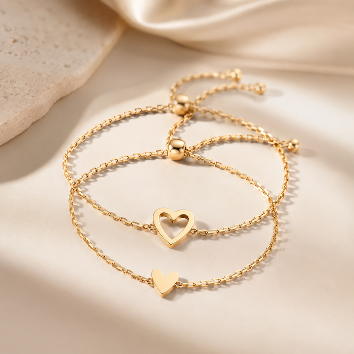 Veda Bremen Herzen Armband Set featuring multiple delicate silver bracelets with heart charms, perfect for layered jewelry styling.