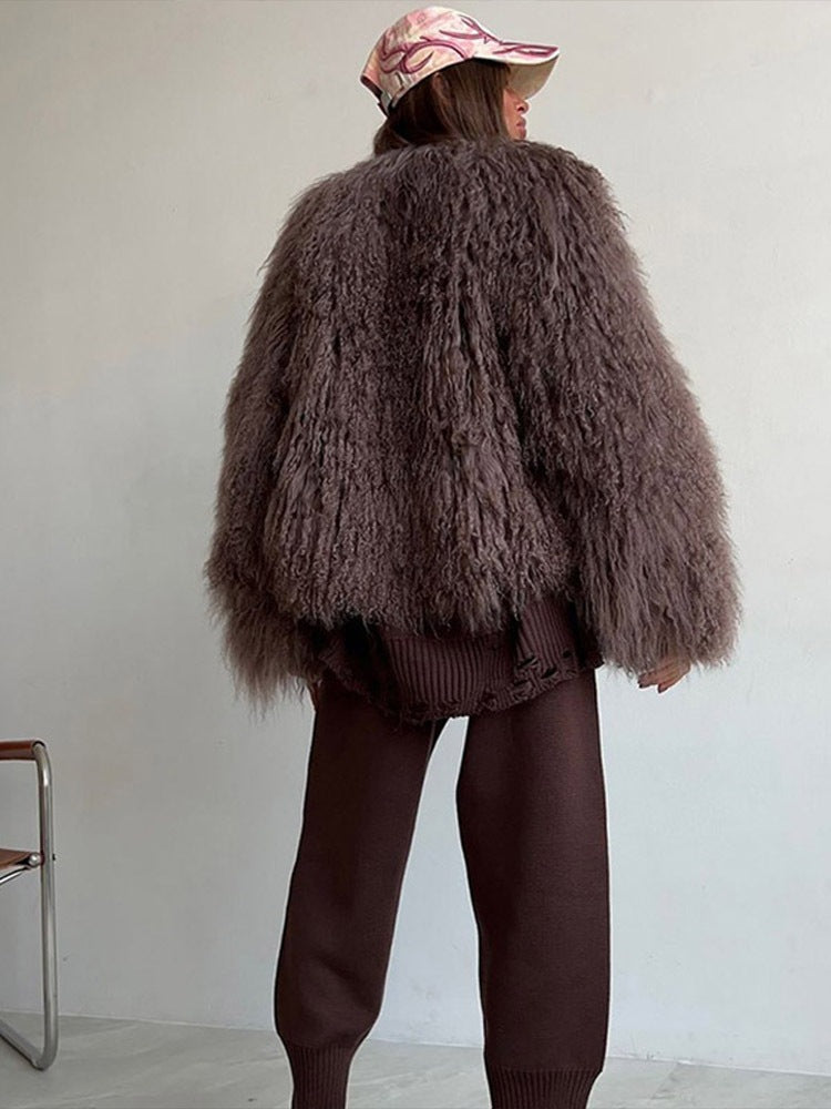 Brown fur jacket from The Wag by Lurolondon.co.uk, featuring a cozy, luxurious fur exterior and stylish design.