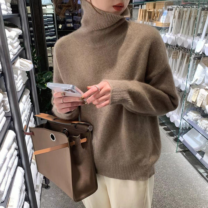 LuroLondon Marilou Cashmere Turtleneck in warm brown, close-up showing soft knit fabric and stylish turtleneck design.